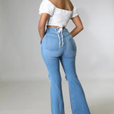Knee Rip Flare Jean in Medium Wash
