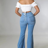 Knee Rip Flare Jean in Medium Wash