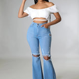 Knee Rip Flare Jean in Medium Wash