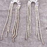 U-SHAPED TASSEL EARRINGS
