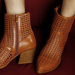 Tri-color collection of women’s woven faux-leather ankle boots with pointed toe and block heel—shown in black, cream, and tan shades.