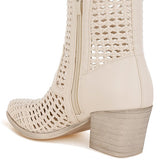 Tri-color collection of women’s woven faux-leather ankle boots with pointed toe and block heel—shown in black, cream, and tan shades.