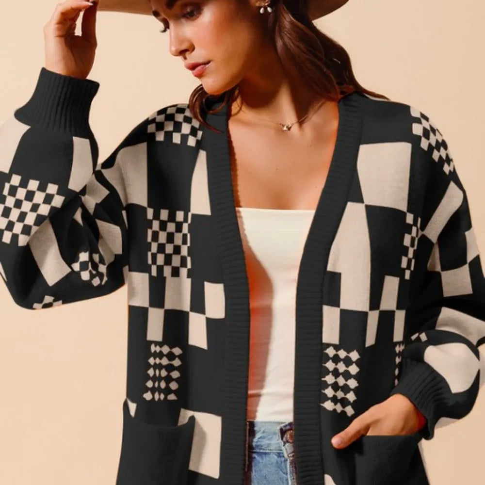 Women's black and cream checkerboard patchwork knit cardigan with open front and front pockets – cozy geometric print sweater for layering.