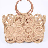 Natural raffia circle-grid handbag featuring wooden round handles and beige drawstring lining.