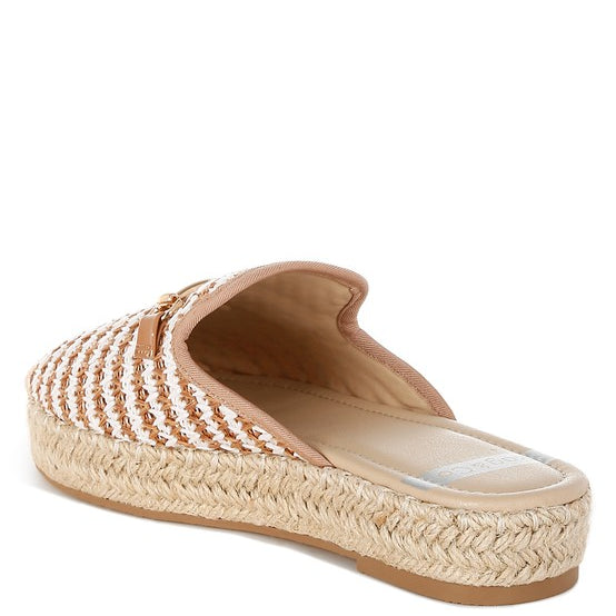 Women’s woven raffia mule espadrille with gold horse-bit hardware and jute platform, shown in black-ivory and tan-white color options.