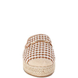 Women’s woven raffia mule espadrille with gold horse-bit hardware and jute platform, shown in black-ivory and tan-white color options.
