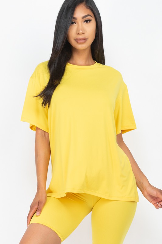 Women's oversized two-piece lounge set featuring a relaxed fit short-sleeve tee and high-waisted biker shorts, available in multiple vibrant colors. Perfect for casual wear, workouts, or athleisure style.