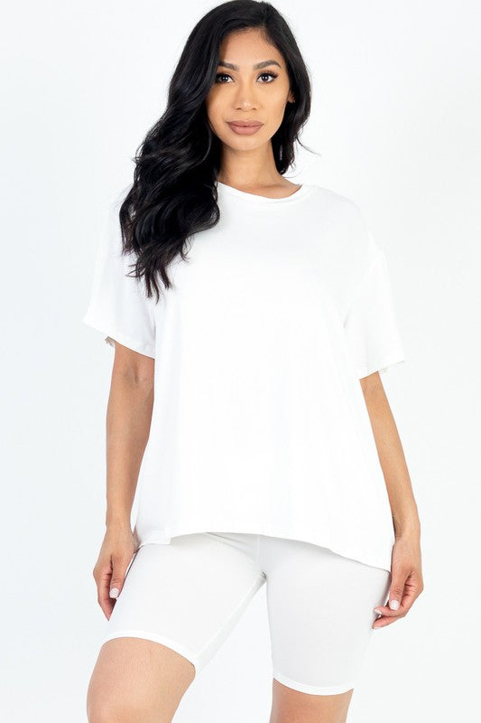 Women's oversized two-piece lounge set featuring a relaxed fit short-sleeve tee and high-waisted biker shorts, available in multiple vibrant colors. Perfect for casual wear, workouts, or athleisure style.