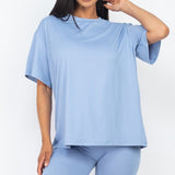 Women's oversized two-piece lounge set featuring a relaxed fit short-sleeve tee and high-waisted biker shorts, available in multiple vibrant colors. Perfect for casual wear, workouts, or athleisure style.