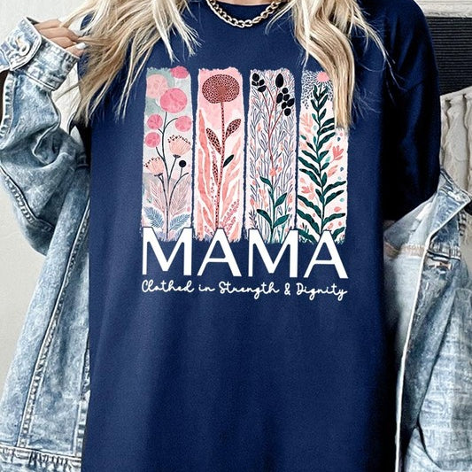 T-shirt with pastel pink and teal floral panel design and bold ‘MAMA’ graphic reading ‘Clothed in Strength & Dignity.