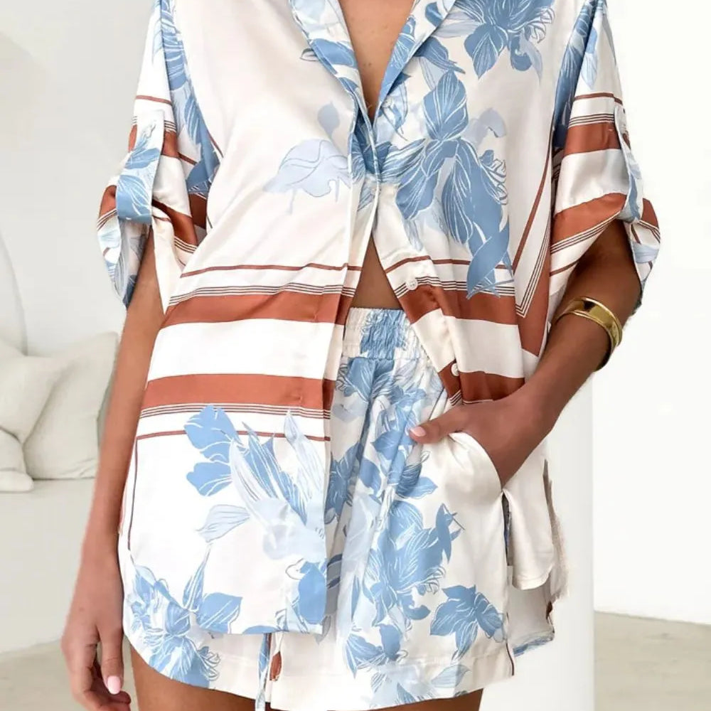 Women's ivory and sky-blue floral stripe Co-Ord set with oversized collared shirt and high-waist shorts – breezy summer matching set.