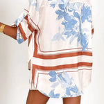Women's ivory and sky-blue floral stripe Co-Ord set with oversized collared shirt and high-waist shorts – breezy summer matching set.