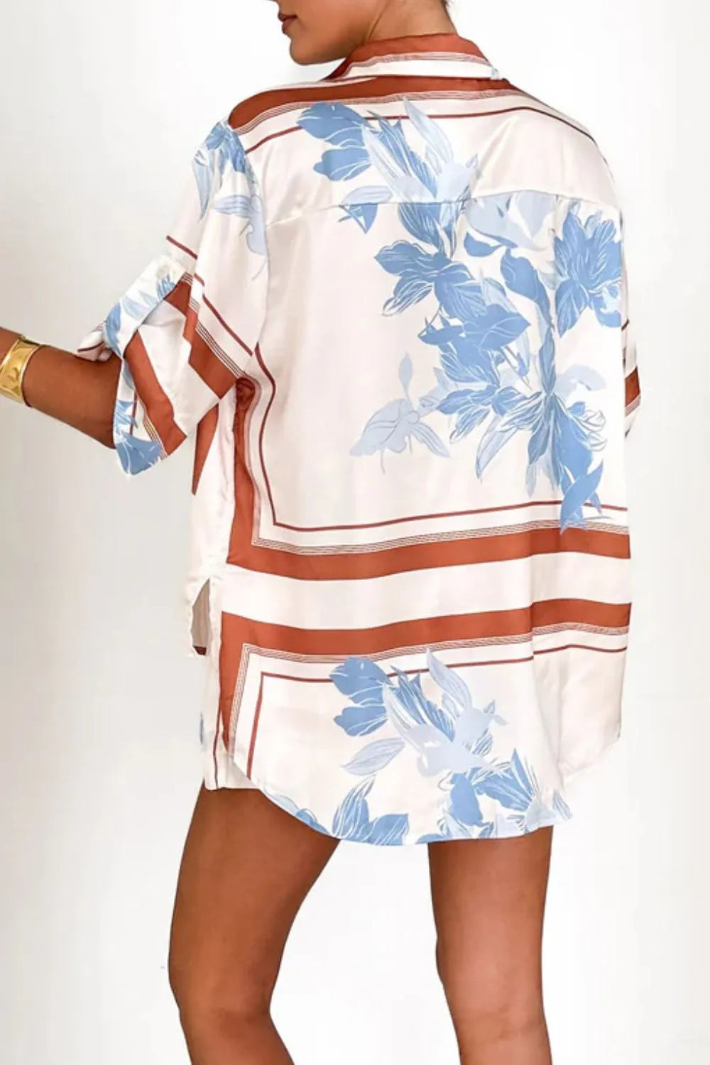 Women's ivory and sky-blue floral stripe Co-Ord set with oversized collared shirt and high-waist shorts – breezy summer matching set.