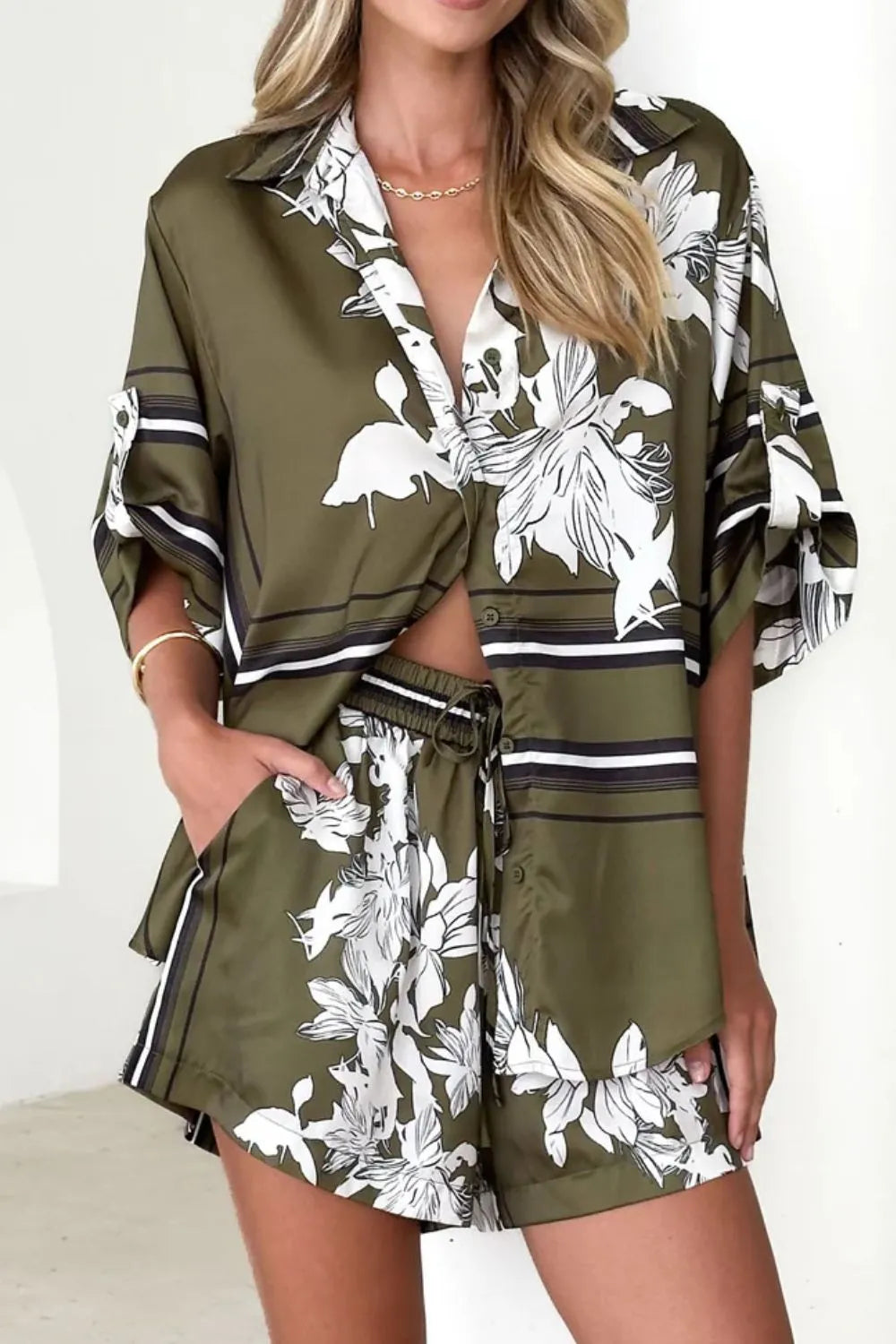 Women's olive green tropical floral two-piece set with oversized button-down shirt and drawstring shorts – lightweight vacation co-ord.