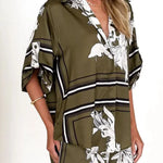Women's olive green tropical floral two-piece set with oversized button-down shirt and drawstring shorts – lightweight vacation co-ord.