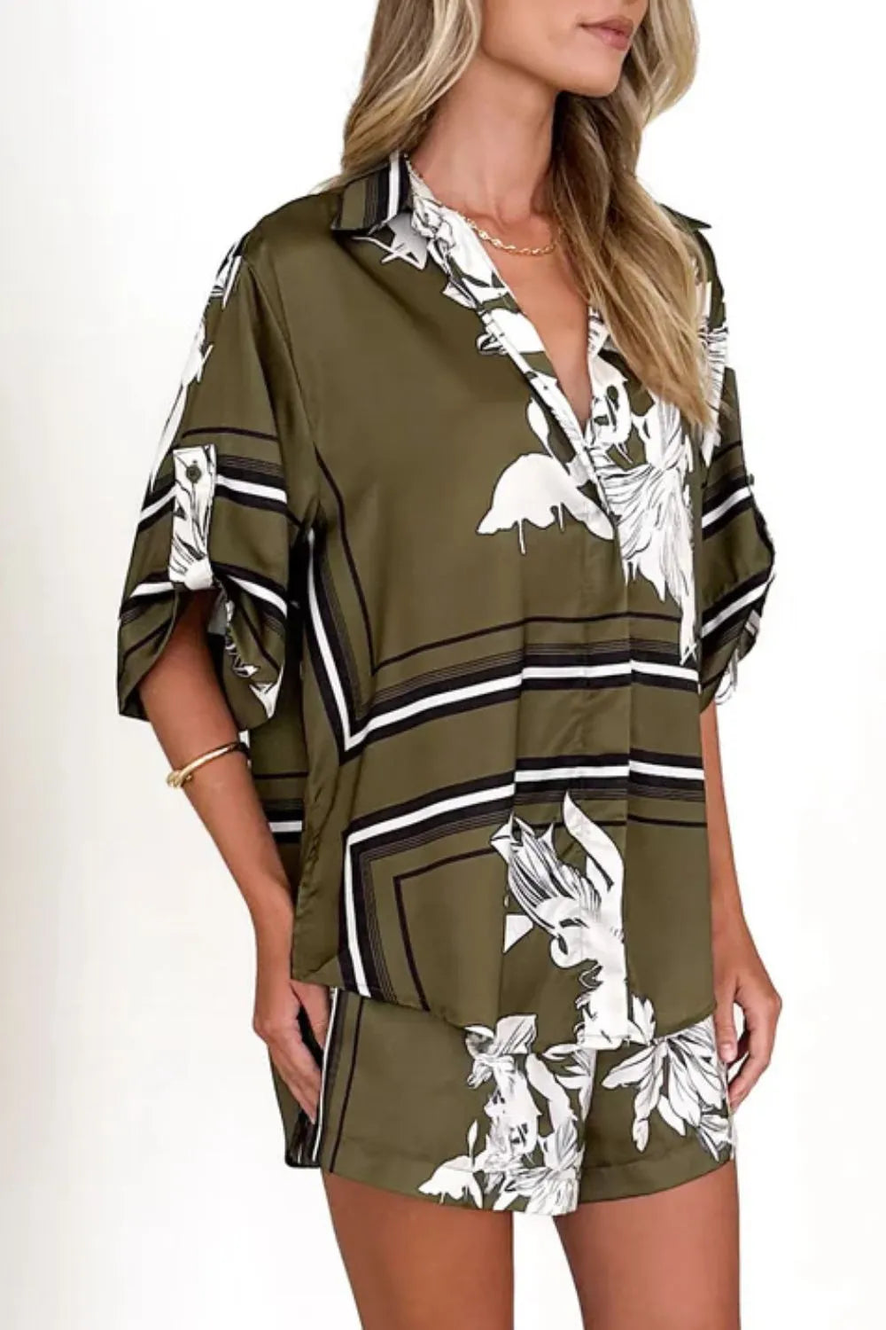 Women's olive green tropical floral two-piece set with oversized button-down shirt and drawstring shorts – lightweight vacation co-ord.