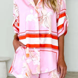Women's blush pink tropical lily stripe two-piece outfit with loose button shirt and comfy drawstring shorts for resort wear.