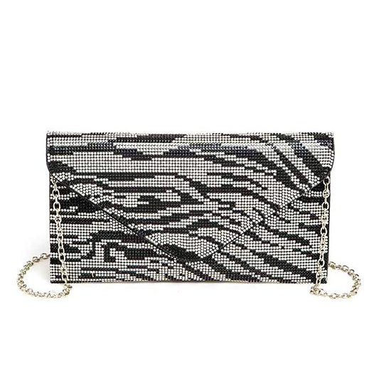 Front view of black and silver rhinestone zebra print clutch with envelope-style flap and silver chain strap.