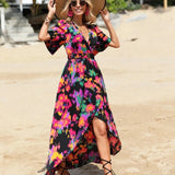 Women's tropical neon floral high-low wrap dress with flutter sleeves, V-neckline, and belted waist – lightweight chiffon vacation maxi.