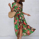 Women's tropical neon floral high-low wrap dress with flutter sleeves, V-neckline, and belted waist – lightweight chiffon vacation maxi.