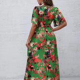 Women's tropical neon floral high-low wrap dress with flutter sleeves, V-neckline, and belted waist – lightweight chiffon vacation maxi.