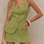 Women's sleeveless blazer mini dress with square neckline, vintage gold buttons, and front pockets – tailored vest-style dress available in multiple colors.