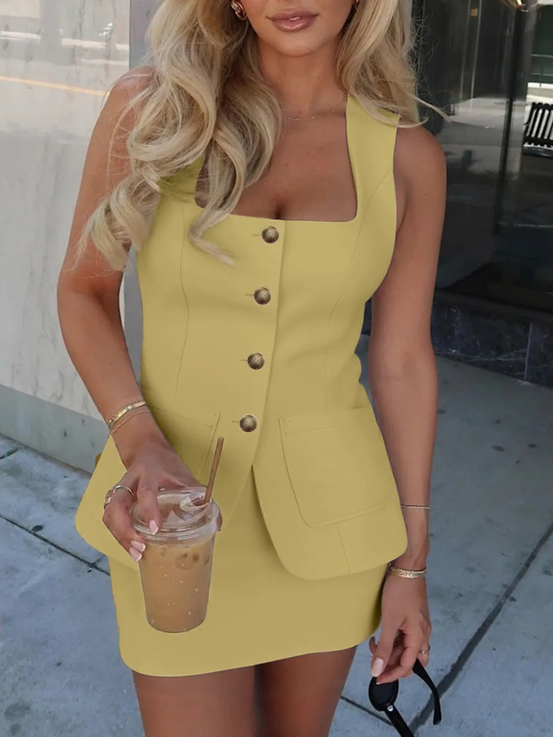 Women's sleeveless blazer mini dress with square neckline, vintage gold buttons, and front pockets – tailored vest-style dress available in multiple colors.