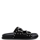 Women’s nubuck faux leather slide sandals with silver buckle straps, metal eyelet embellishments, and flat black soles in olive green and black color options.