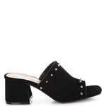 Black microsuede open-toe mule with silver cone studs and mid block heel, shown from multiple angles against white background.
