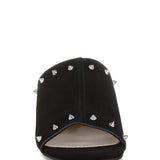 Black microsuede open-toe mule with silver cone studs and mid block heel, shown from multiple angles against white background.