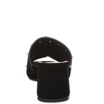 Black microsuede open-toe mule with silver cone studs and mid block heel, shown from multiple angles against white background.