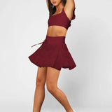 Women's wine red ruffle athletic skort with high-waist drawstring waistband and built-in shorts – moisture-wicking tennis skirt.