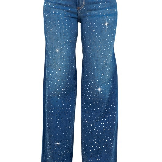 Woman modeling high-rise wide-leg blue “Starlight Rhinestone” jeans, denim sprinkled with sparkling crystal studs and star-dot back pockets.