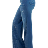 Woman modeling high-rise wide-leg blue “Starlight Rhinestone” jeans, denim sprinkled with sparkling crystal studs and star-dot back pockets.