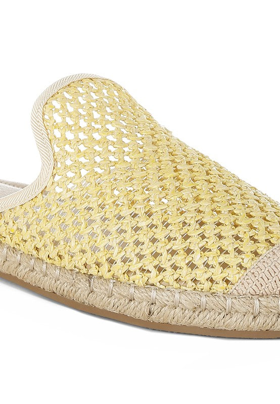 Backless women’s espadrille mule with woven raffia upper and jute sole, shown in yellow, black, and natural beige color options.