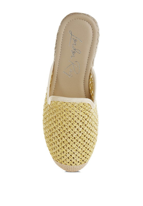 Backless women’s espadrille mule with woven raffia upper and jute sole, shown in yellow, black, and natural beige color options.