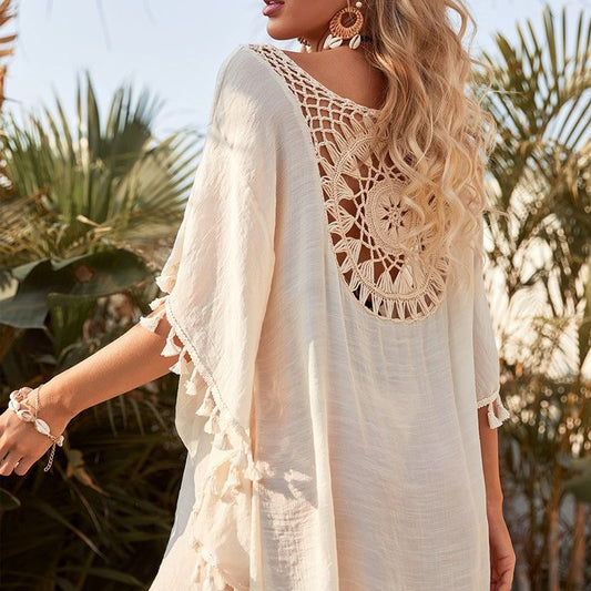 Women’s boho crochet-medallion beach cover-up poncho with tassel trim in lightweight cotton gauze, shown in Cream.