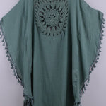 Women’s boho crochet-medallion beach cover-up poncho with tassel trim in lightweight cotton gauze, shown in Sage Green.