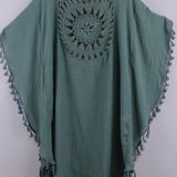 Women’s boho crochet-medallion beach cover-up poncho with tassel trim in lightweight cotton gauze, shown in Sage Green.