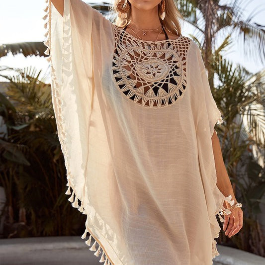 Women’s boho crochet-medallion beach cover-up poncho with tassel trim in lightweight cotton gauze, shown in Cream.