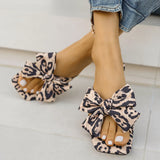 Women's leopard print bow slide sandals with square toe – stylish slip-on flat summer shoes for casual wear, featuring oversized knot bow detail.
