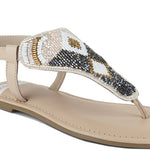 Pink, black and beige flat sandals with Aztec-style hand-beaded T-strap uppers, adjustable ankle buckle and cushioned footbed, boho summer women’s footwear.