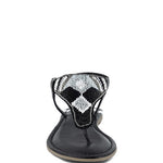 Pink, black and beige flat sandals with Aztec-style hand-beaded T-strap uppers, adjustable ankle buckle and cushioned footbed, boho summer women’s footwear.