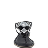 Pink, black and beige flat sandals with Aztec-style hand-beaded T-strap uppers, adjustable ankle buckle and cushioned footbed, boho summer women’s footwear.