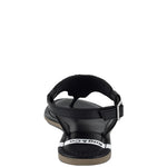 Pink, black and beige flat sandals with Aztec-style hand-beaded T-strap uppers, adjustable ankle buckle and cushioned footbed, boho summer women’s footwear.