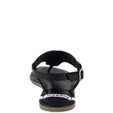 Pink, black and beige flat sandals with Aztec-style hand-beaded T-strap uppers, adjustable ankle buckle and cushioned footbed, boho summer women’s footwear.