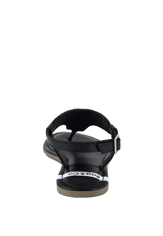 Pink, black and beige flat sandals with Aztec-style hand-beaded T-strap uppers, adjustable ankle buckle and cushioned footbed, boho summer women’s footwear.