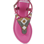 Pink, black and beige flat sandals with Aztec-style hand-beaded T-strap uppers, adjustable ankle buckle and cushioned footbed, boho summer women’s footwear.