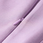 Short Sleeve Zipper Collared Elastic High Waist Romper in pink up close of the zipper