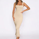 Women's beige nude square-neck bodycon midi dress with smooth ribbed fabric and subtle flared hem.